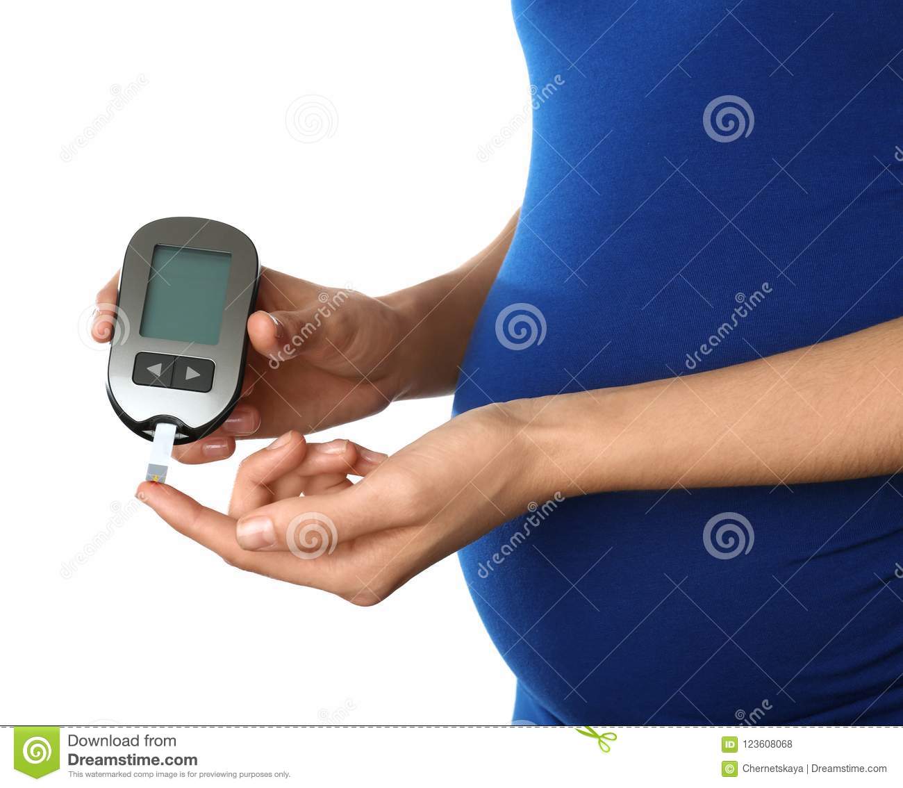 Pregnant Woman Checking Blood Sugar Level Stock Photo